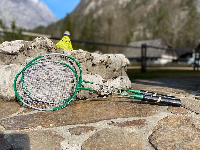 Hotel Satisfaction Boost Offering Badminton Racket Amenities for Guests Enjoyment